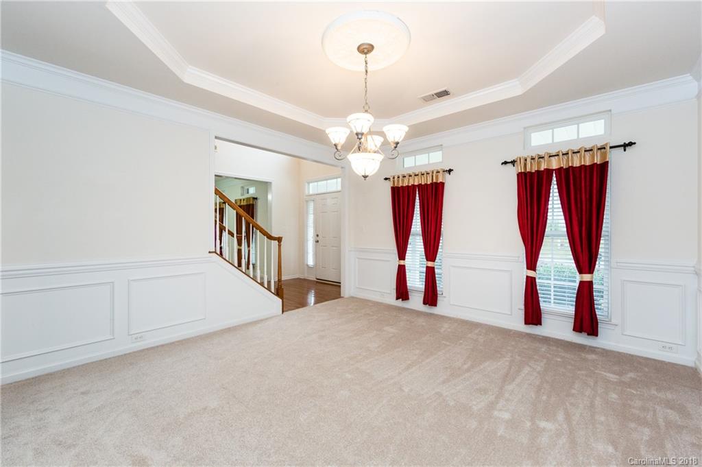 7810 Greylock Ridge Road Matthews, NC 28105 - Photo 5 of 31 a view of empty room with windows