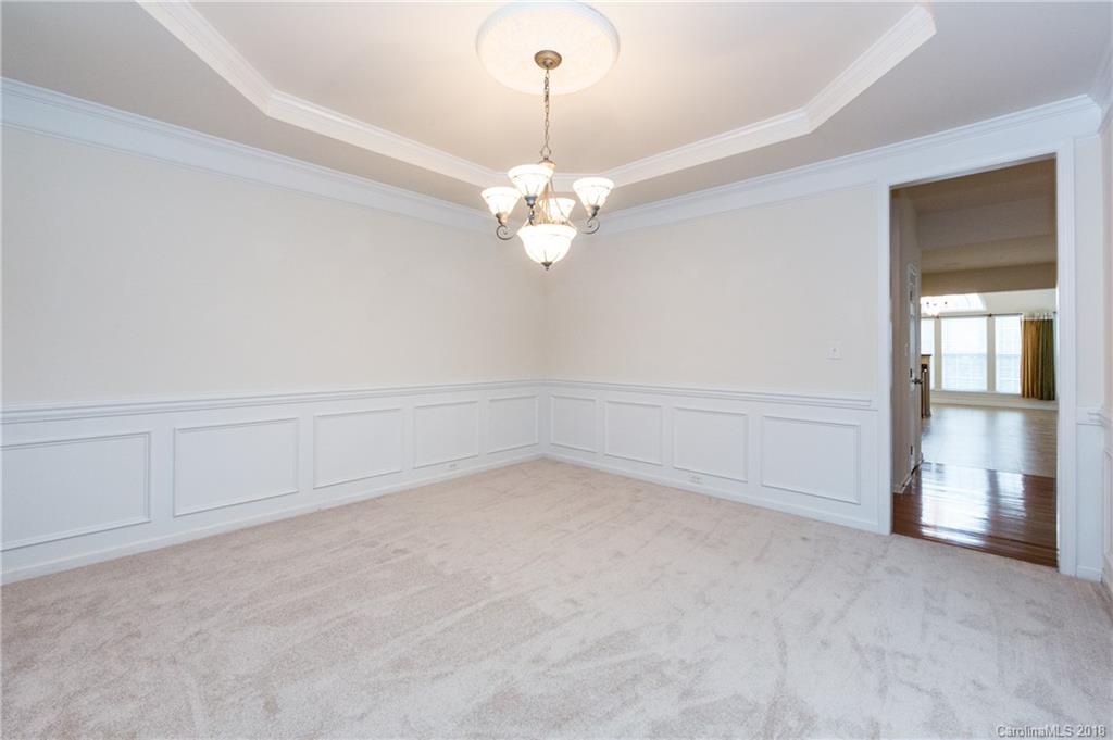 7810 Greylock Ridge Road Matthews, NC 28105 - Photo 6 of 31 a view of an empty room with chandelier fan