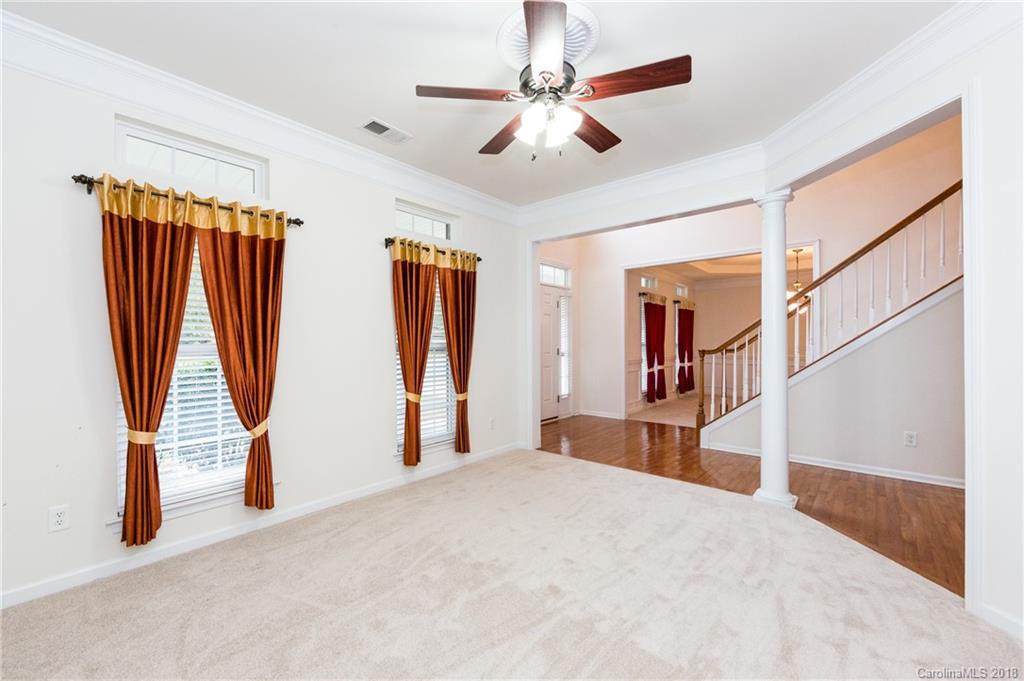 7810 Greylock Ridge Road Matthews, NC 28105 - Photo 7 of 31 a view of a room with gym equipment
