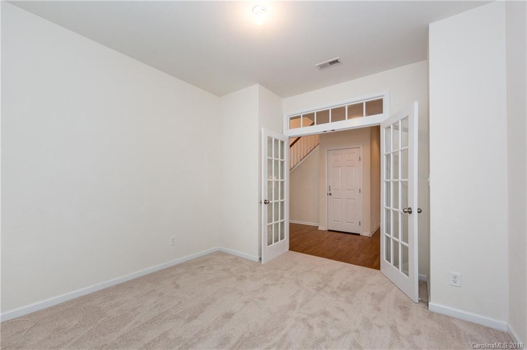 7810 Greylock Ridge Road Matthews, NC 28105 - Photo 9 of 31 a view of an empty room
