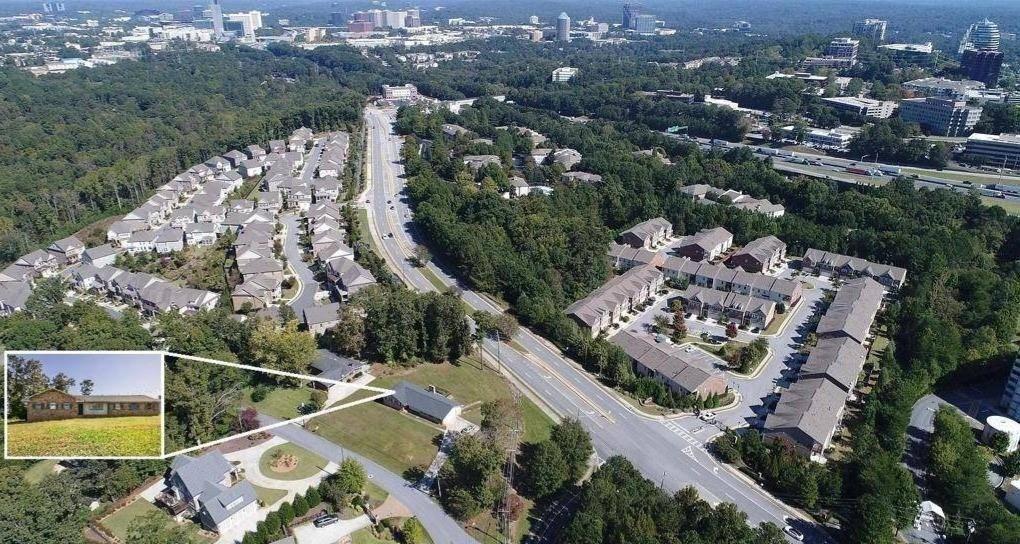 3475 Valley Vista Road Southeast Smyrna, GA 30080 - Photo 3 of 5 an aerial view of a house with a yard