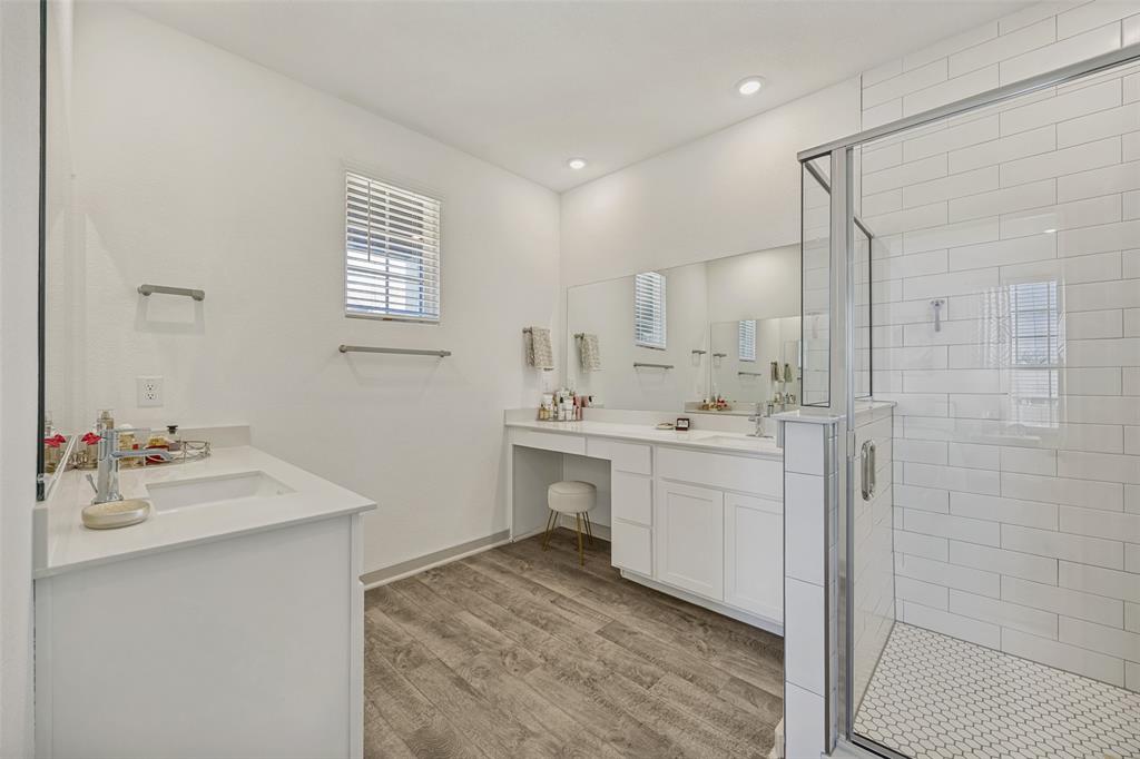 1650 Jessica Lane Allen, TX 75002 - Photo 21 of 25 a bathroom with a sink double vanity and shower