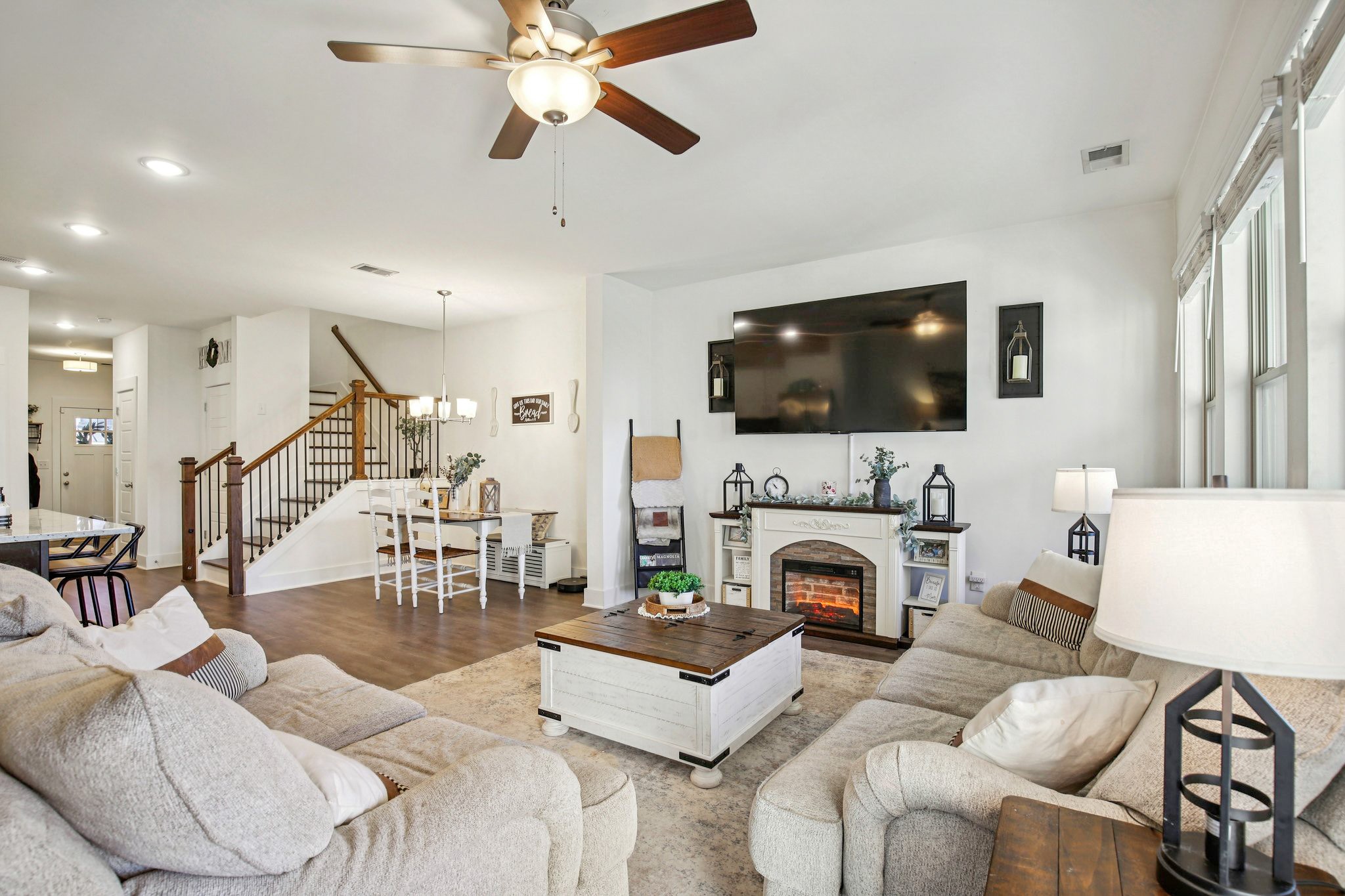 513 Baxter Crossing Lebanon, TN 37087 - Photo 12 of 74 a living room with furniture a fireplace and a flat screen tv