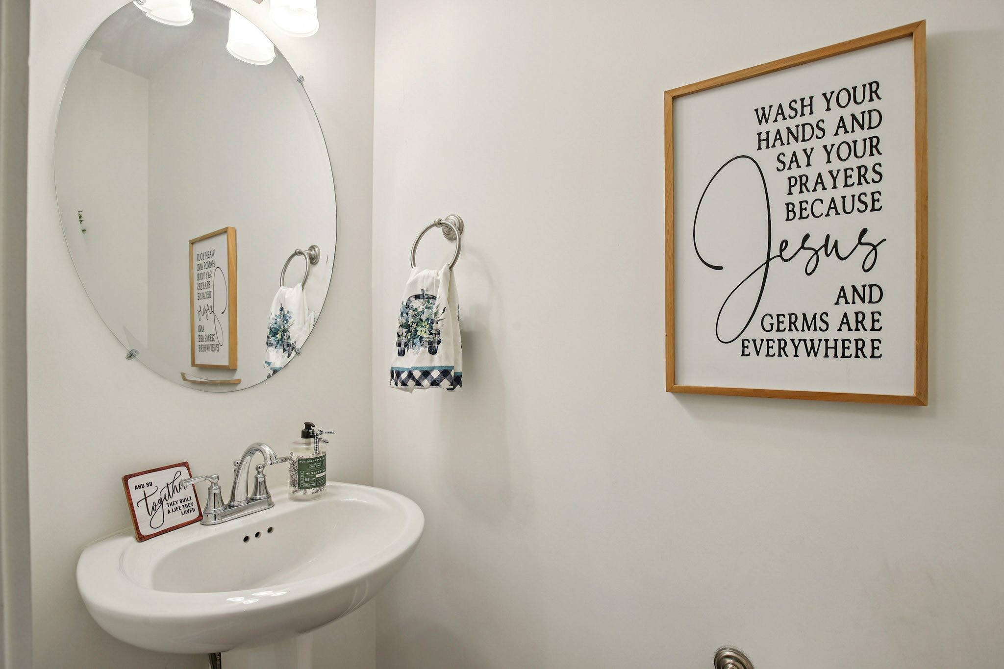 513 Baxter Crossing Lebanon, TN 37087 - Photo 16 of 74 a bathroom with a sink and a mirror