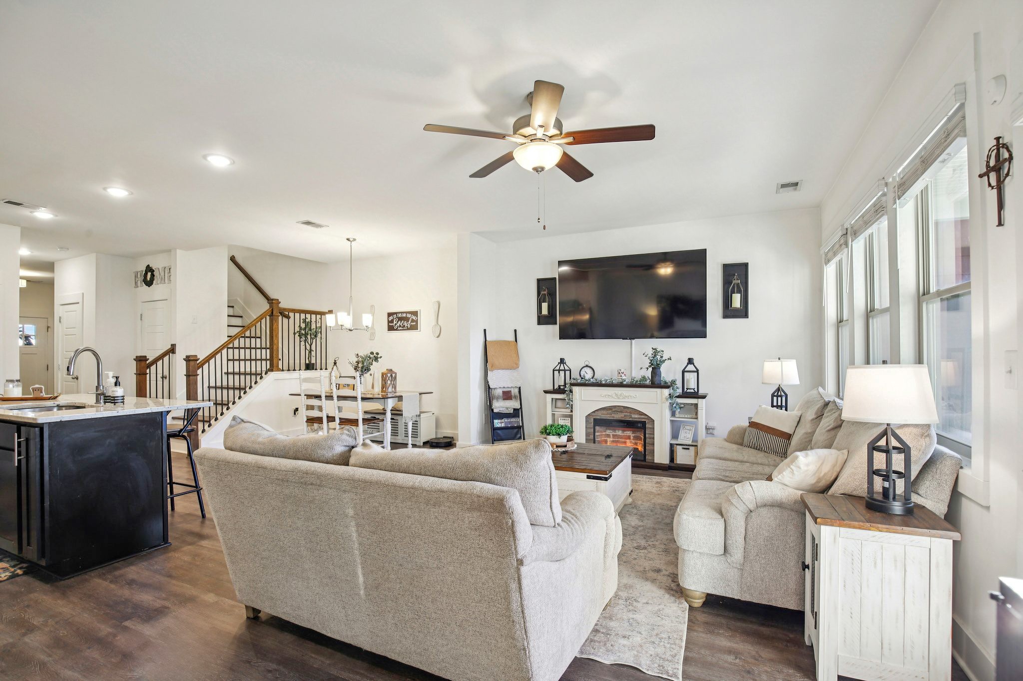 513 Baxter Crossing Lebanon, TN 37087 - Photo 21 of 74 a living room with furniture a fireplace and a flat screen tv