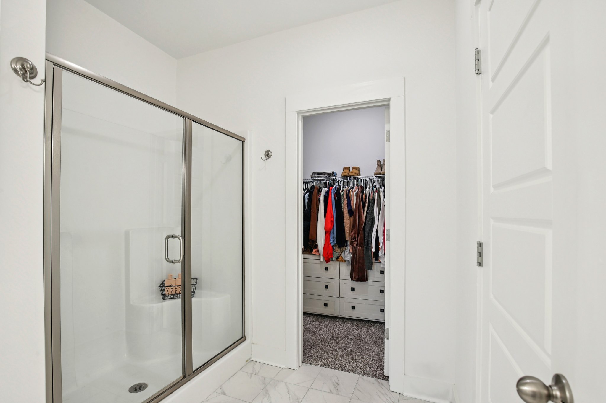 513 Baxter Crossing Lebanon, TN 37087 - Photo 48 of 74 a view of walk in closet with clothes