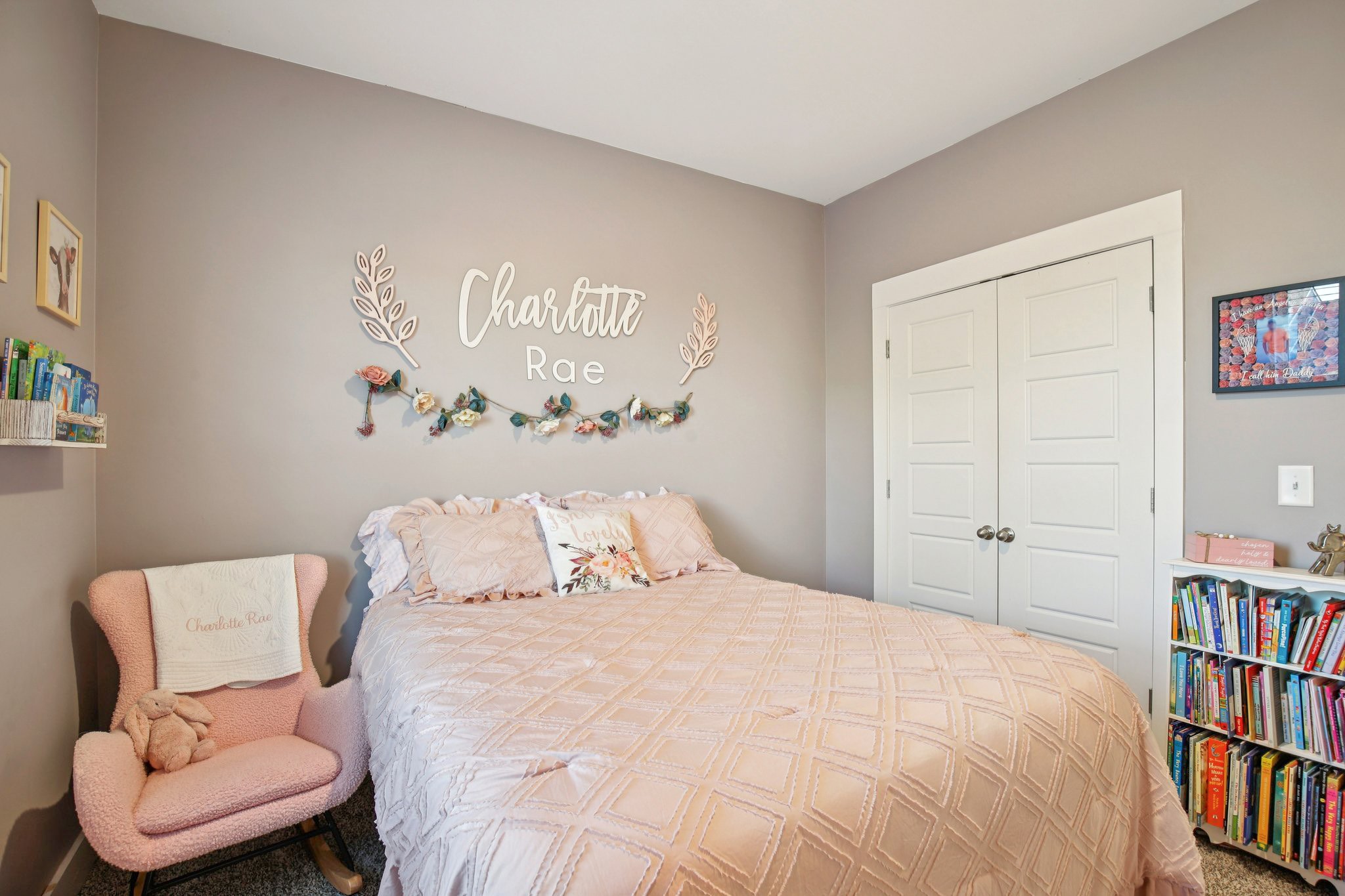 513 Baxter Crossing Lebanon, TN 37087 - Photo 55 of 74 a bedroom with a bed and a book shelf