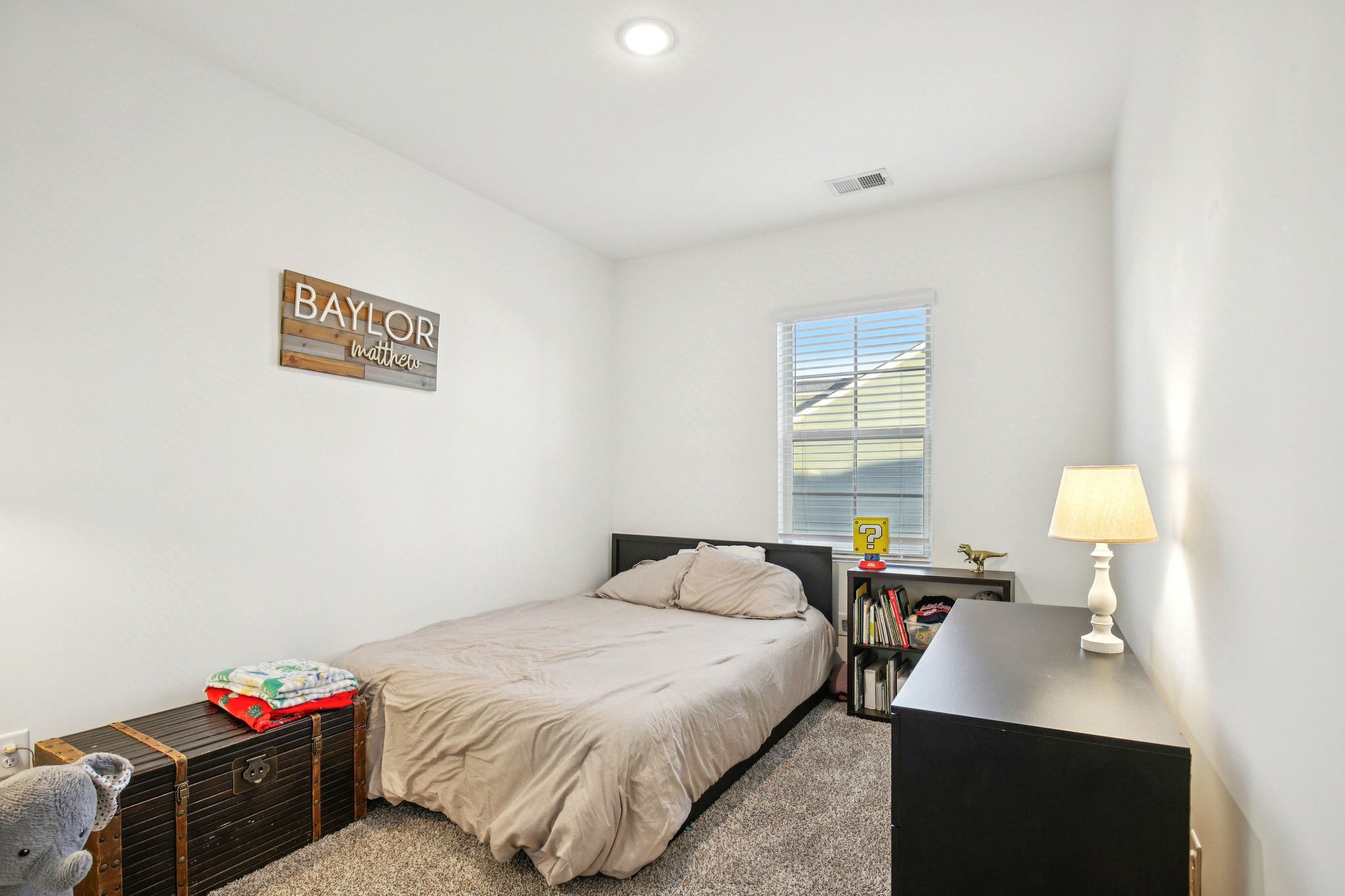 513 Baxter Crossing Lebanon, TN 37087 - Photo 57 of 74 a bedroom with a bed and a window