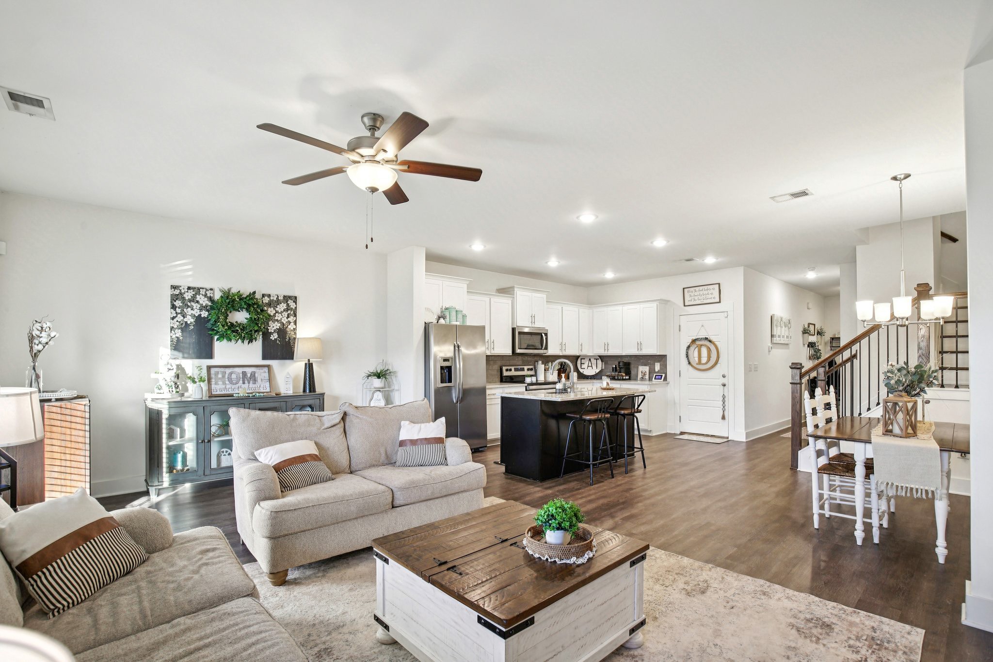 513 Baxter Crossing Lebanon, TN 37087 - Photo 7 of 74 a living room with furniture kitchen view and a chandelier