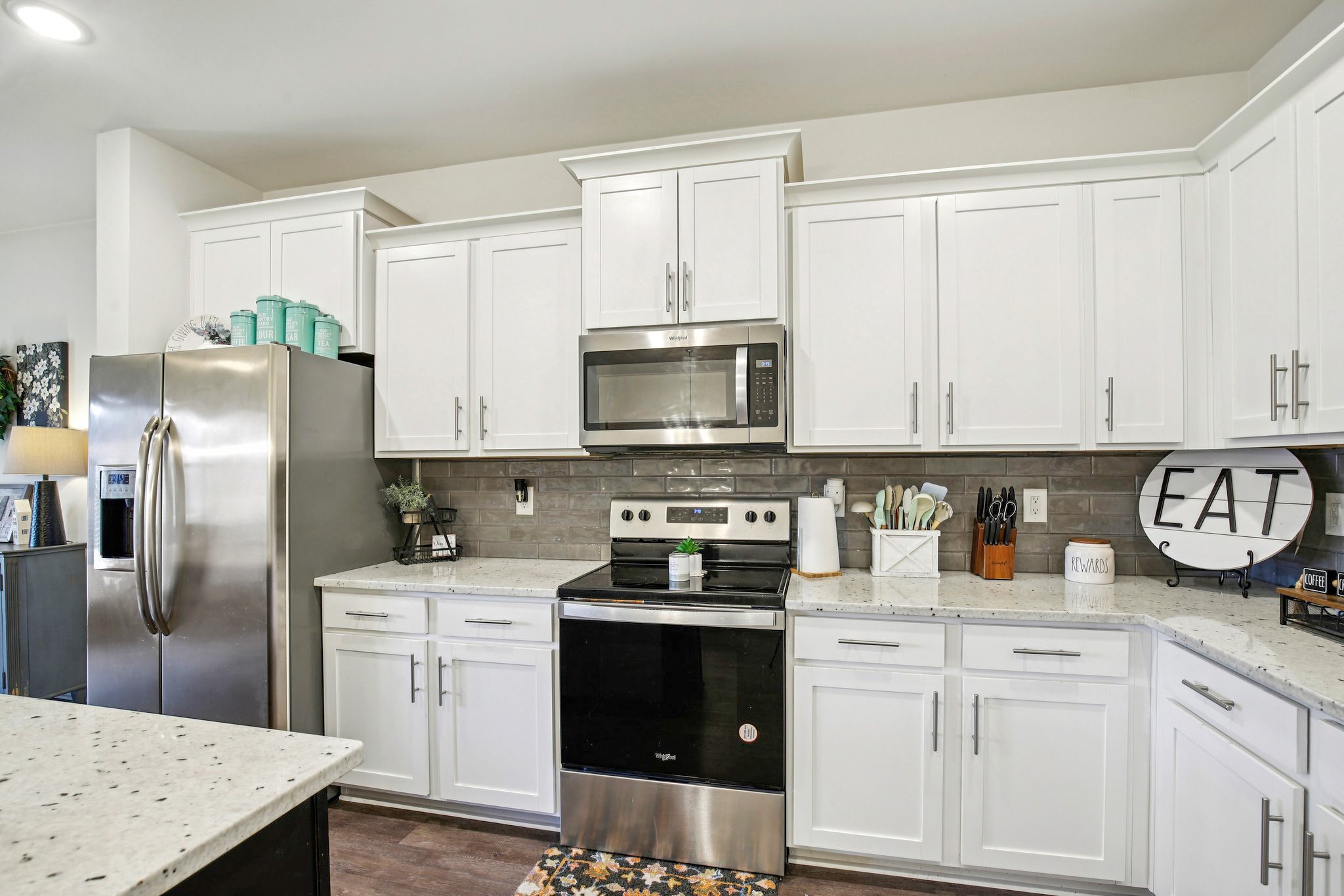 513 Baxter Crossing Lebanon, TN 37087 - Photo 9 of 74 a kitchen with stainless steel appliances a refrigerator stove and microwave