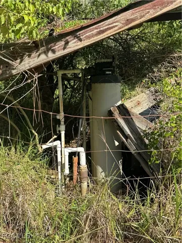 a view of a big yard with an trees