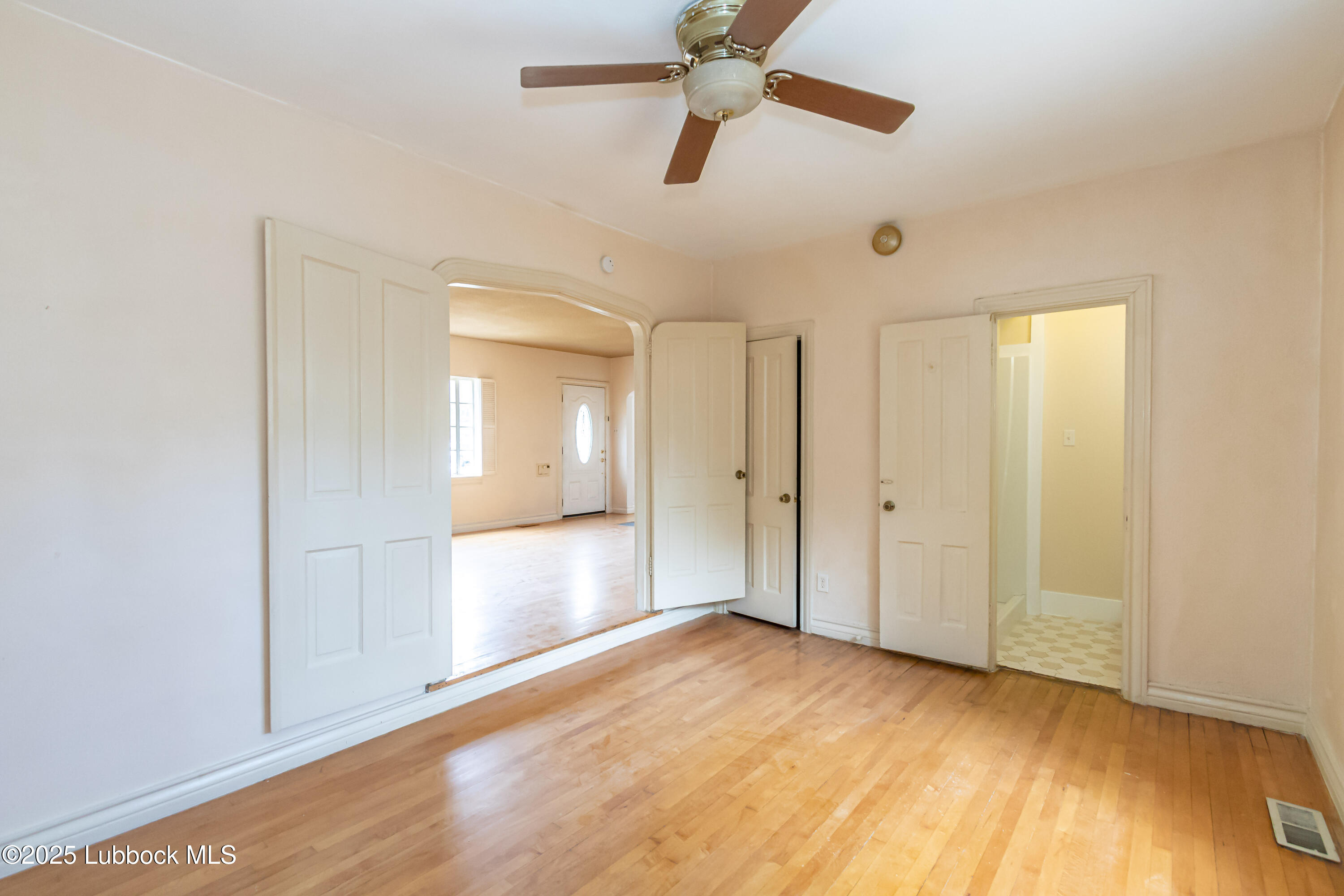 2324 17th Street Lubbock, TX 79401 - Photo 17 of 34 a view of empty room with wooden floor