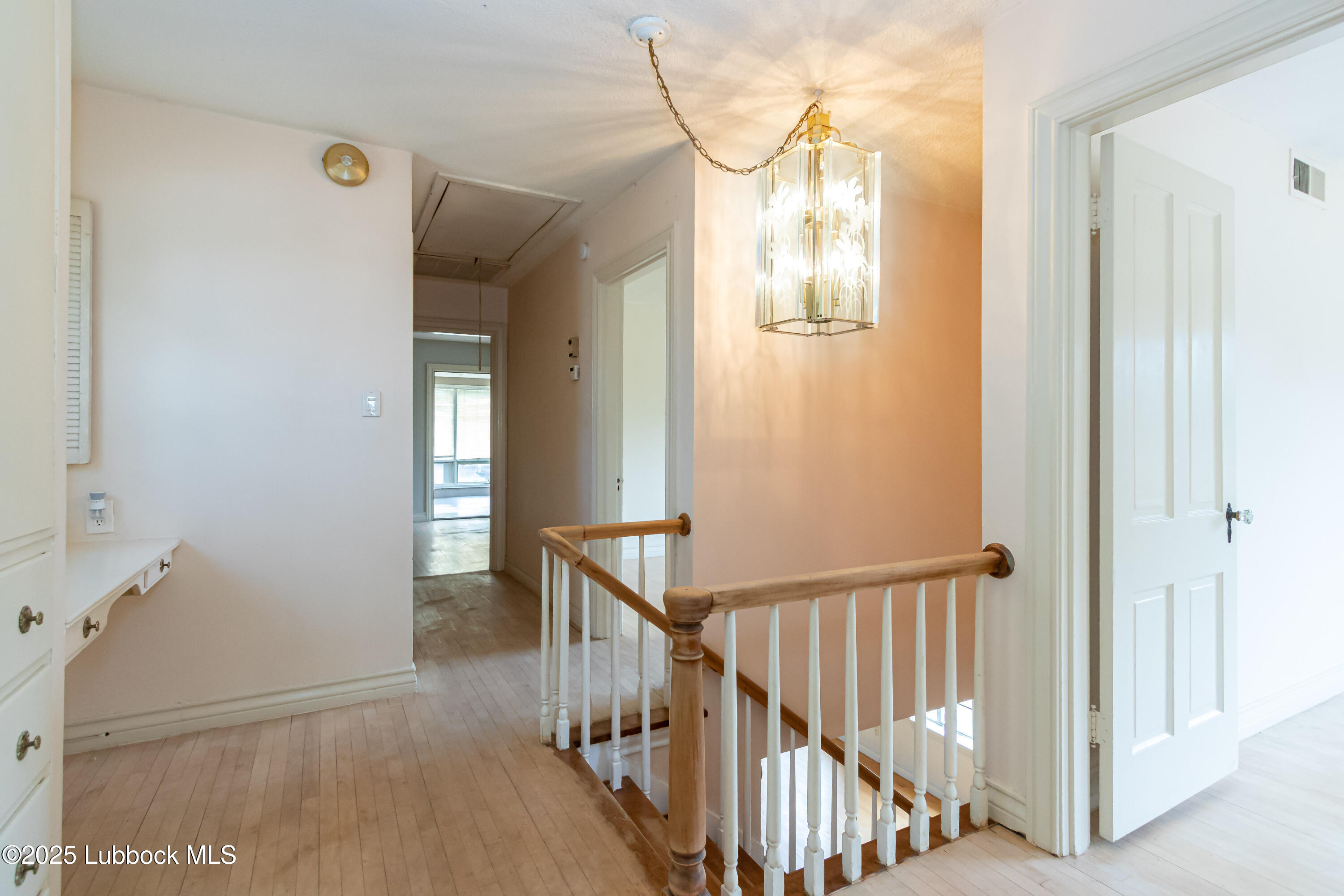 2324 17th Street Lubbock, TX 79401 - Photo 20 of 34 a view of a hallway with wooden floor and entryway