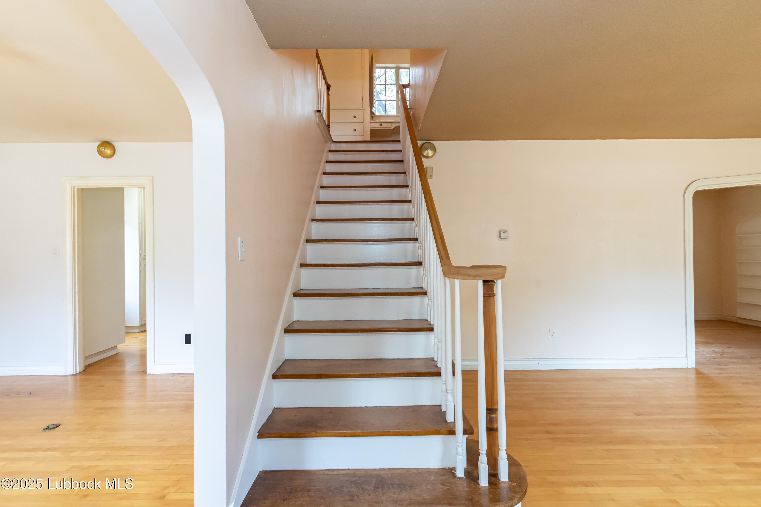 2324 17th Street Lubbock, TX 79401 - Photo 5 of 34 a view of entryway and hall with wooden floor