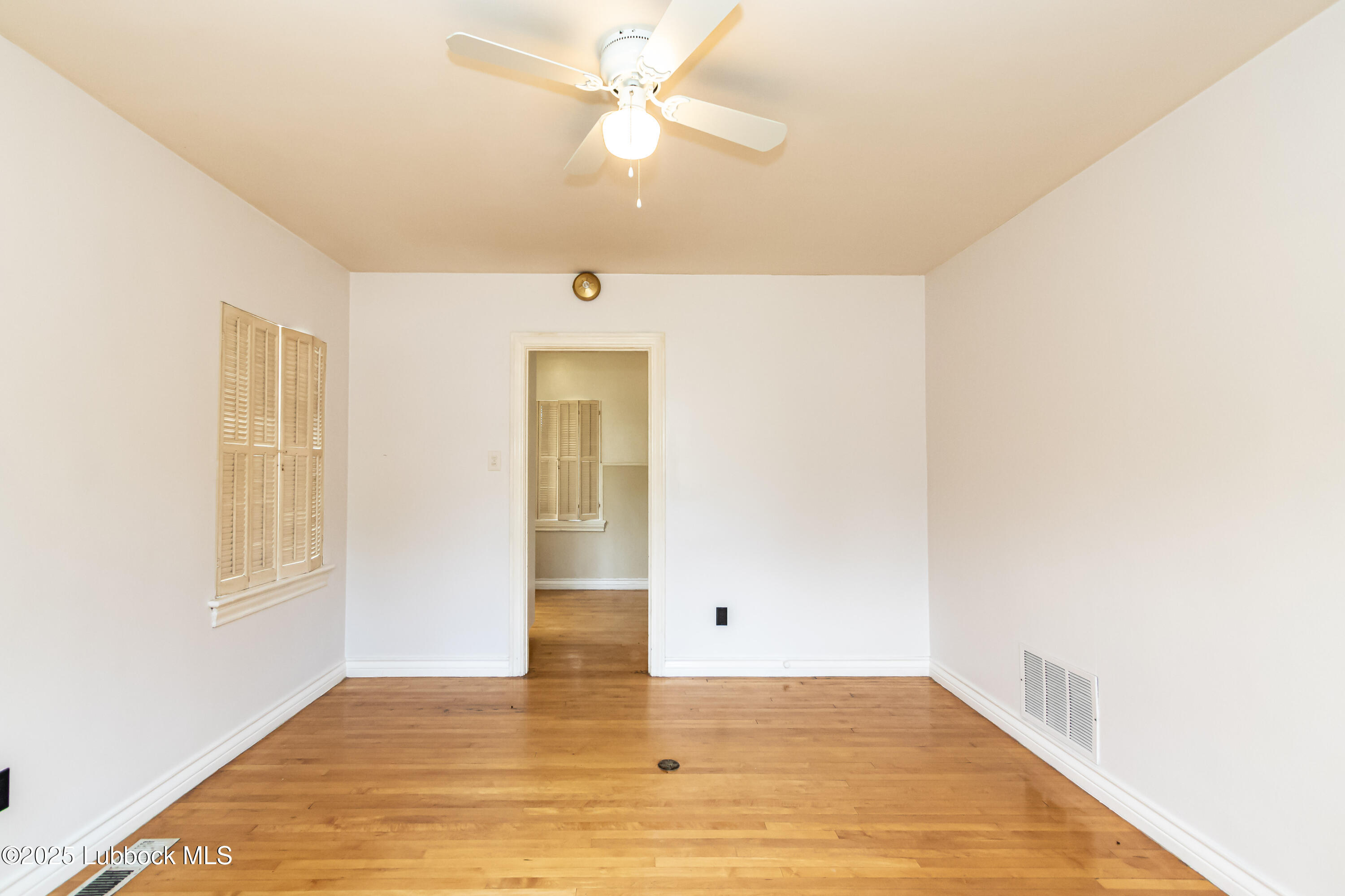 2324 17th Street Lubbock, TX 79401 - Photo 8 of 34 wooden floor in an empty room