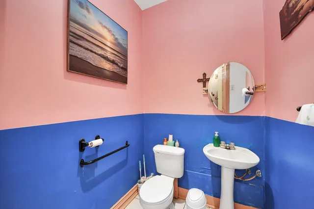 a kitchen with sink cabinets and appliances