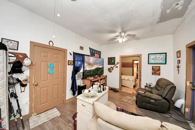 a view of a entryway with storage and utility room