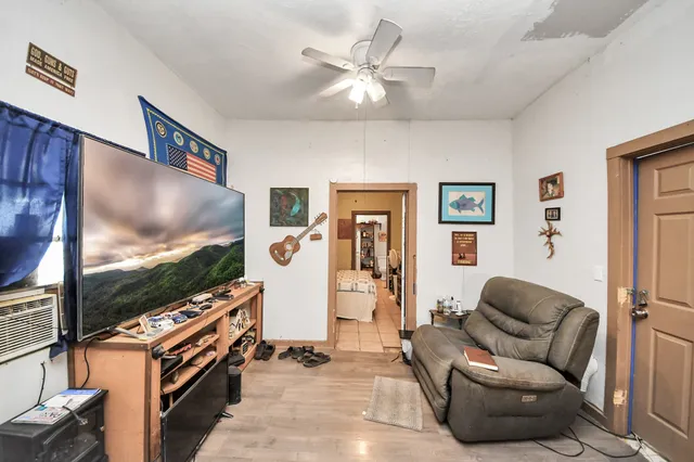 a view of a livingroom with furniture and furniture
