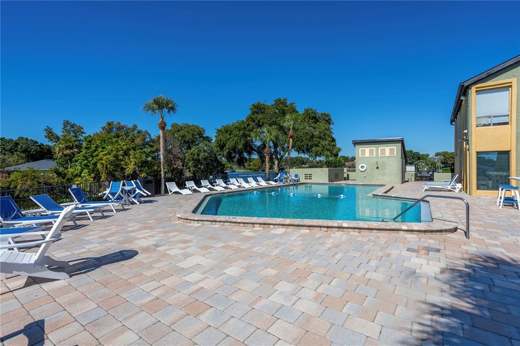 902 Lake Destiny Road, Unit C Altamonte Springs, FL 32714 - Photo 14 of 24 a view of a swimming pool with a patio