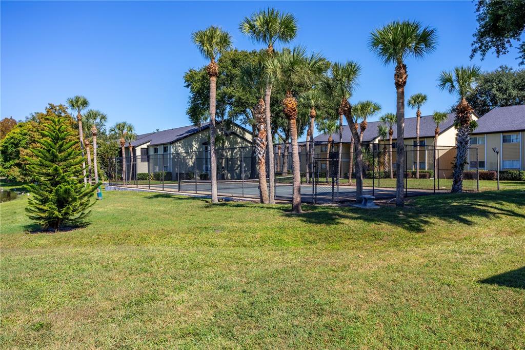 902 Lake Destiny Road, Unit C Altamonte Springs, FL 32714 - Photo 17 of 24 a view of a park with palm trees