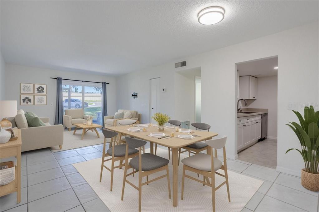 902 Lake Destiny Road, Unit C Altamonte Springs, FL 32714 - Photo 2 of 24 a view of a dining room with furniture and wooden floor