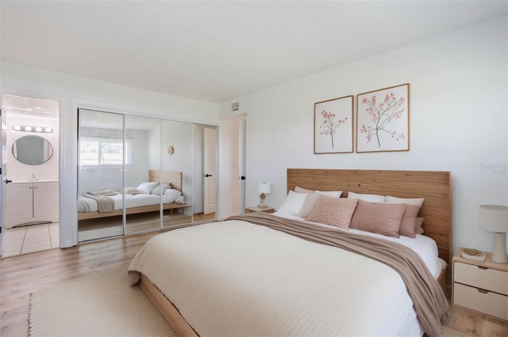 902 Lake Destiny Road, Unit C Altamonte Springs, FL 32714 - Photo 7 of 24 a bedroom with a bed and a view of bathroom