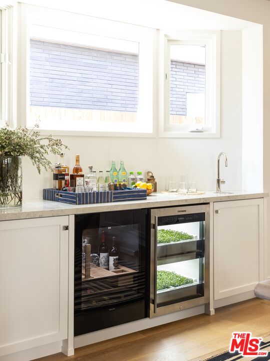 929 Marco Place Venice, CA 90291 - Photo 11 of 38 a kitchen with a sink and a microwave
