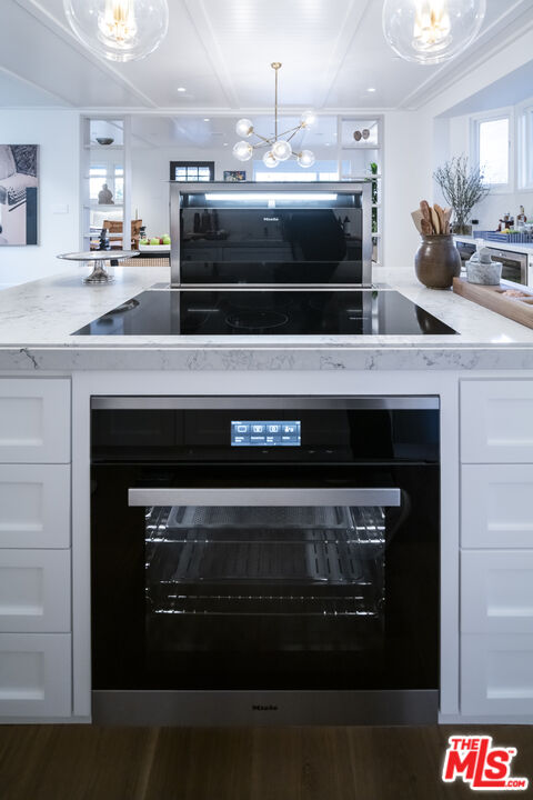 929 Marco Place Venice, CA 90291 - Photo 13 of 38 a stove top oven sitting inside of a kitchen