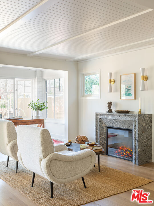 929 Marco Place Venice, CA 90291 - Photo 7 of 38 a living room with furniture and a fireplace