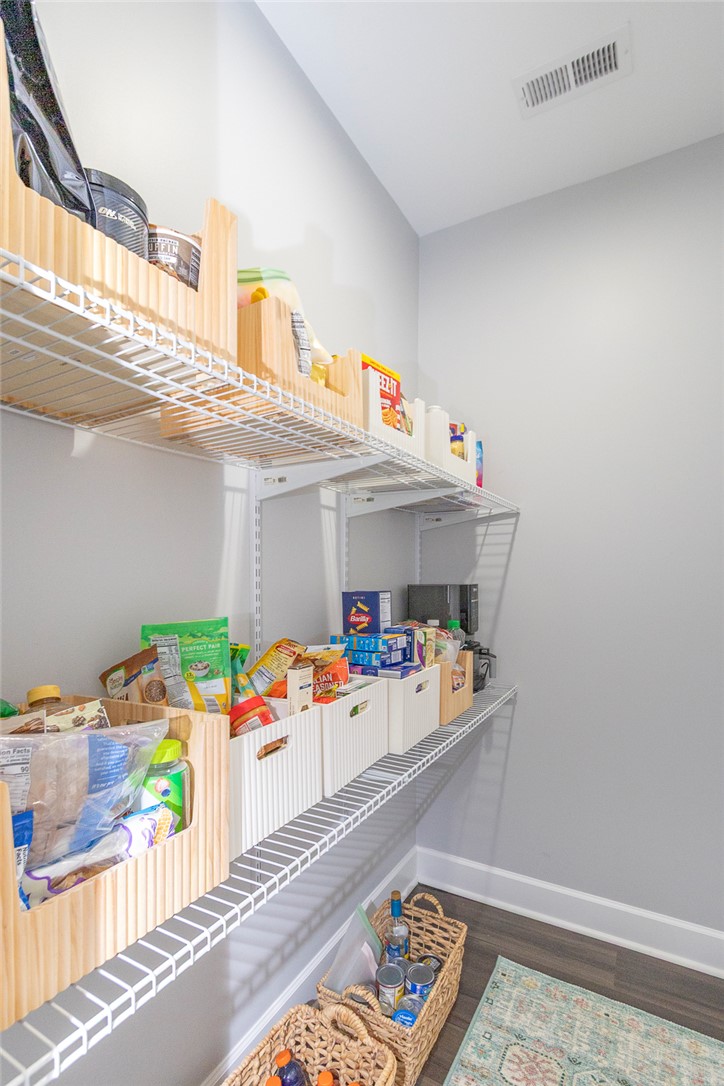 3080 McGee Road Iva, SC 29655 - Photo 13 of 49 Functional pantry storage, well-organized with durable wire shelving, enhances kitchen utility.