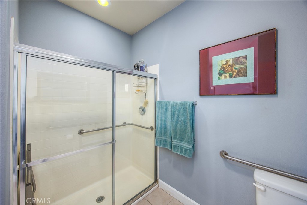 47298 Twin Pines Road Banning, CA 92220 - Photo 40 of 65 a bathroom with a shower and a sink