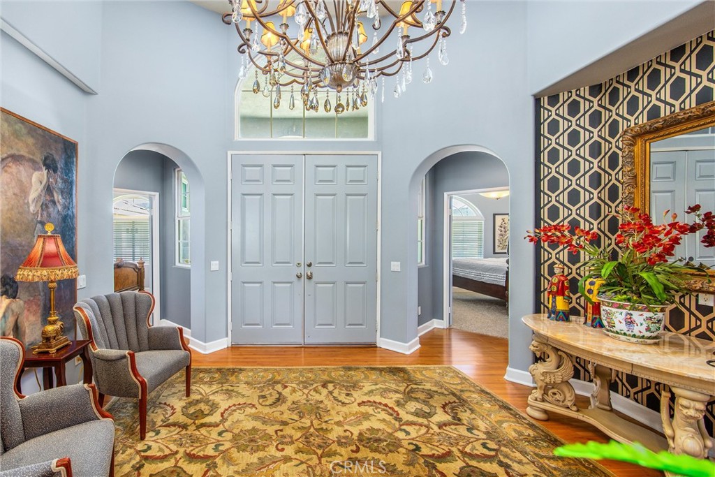 47298 Twin Pines Road Banning, CA 92220 - Photo 5 of 65 a living room filled with furniture and a potted plant