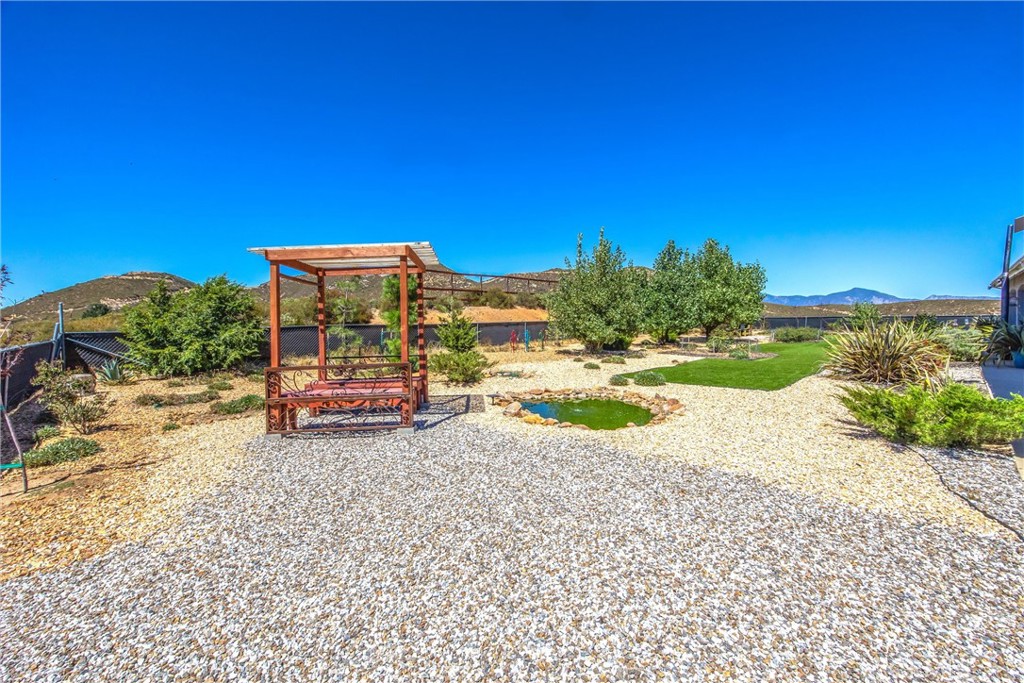 47298 Twin Pines Road Banning, CA 92220 - Photo 53 of 65 a view of a lake with a yard