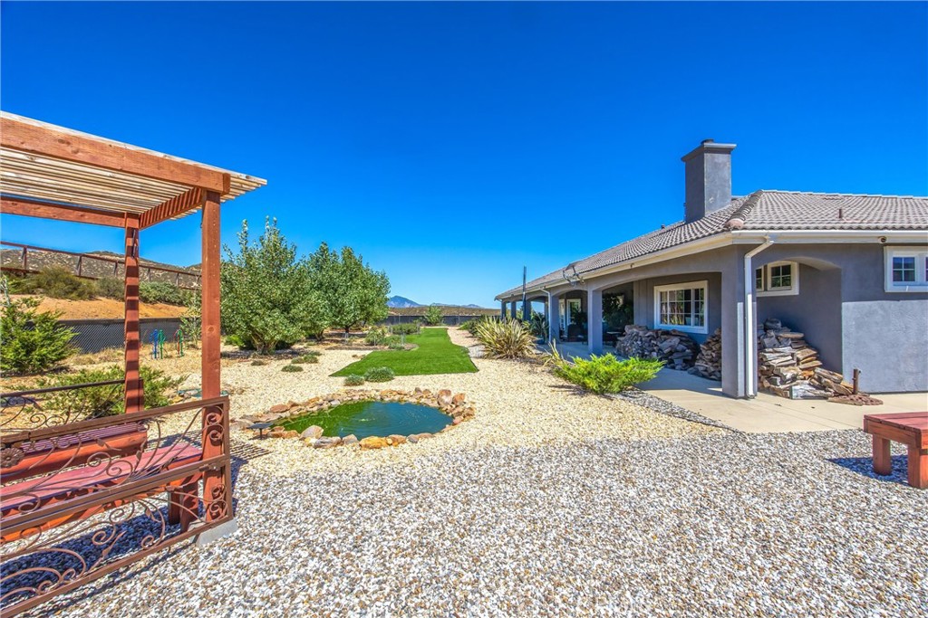 47298 Twin Pines Road Banning, CA 92220 - Photo 54 of 65 Entertaining backyard, social stations