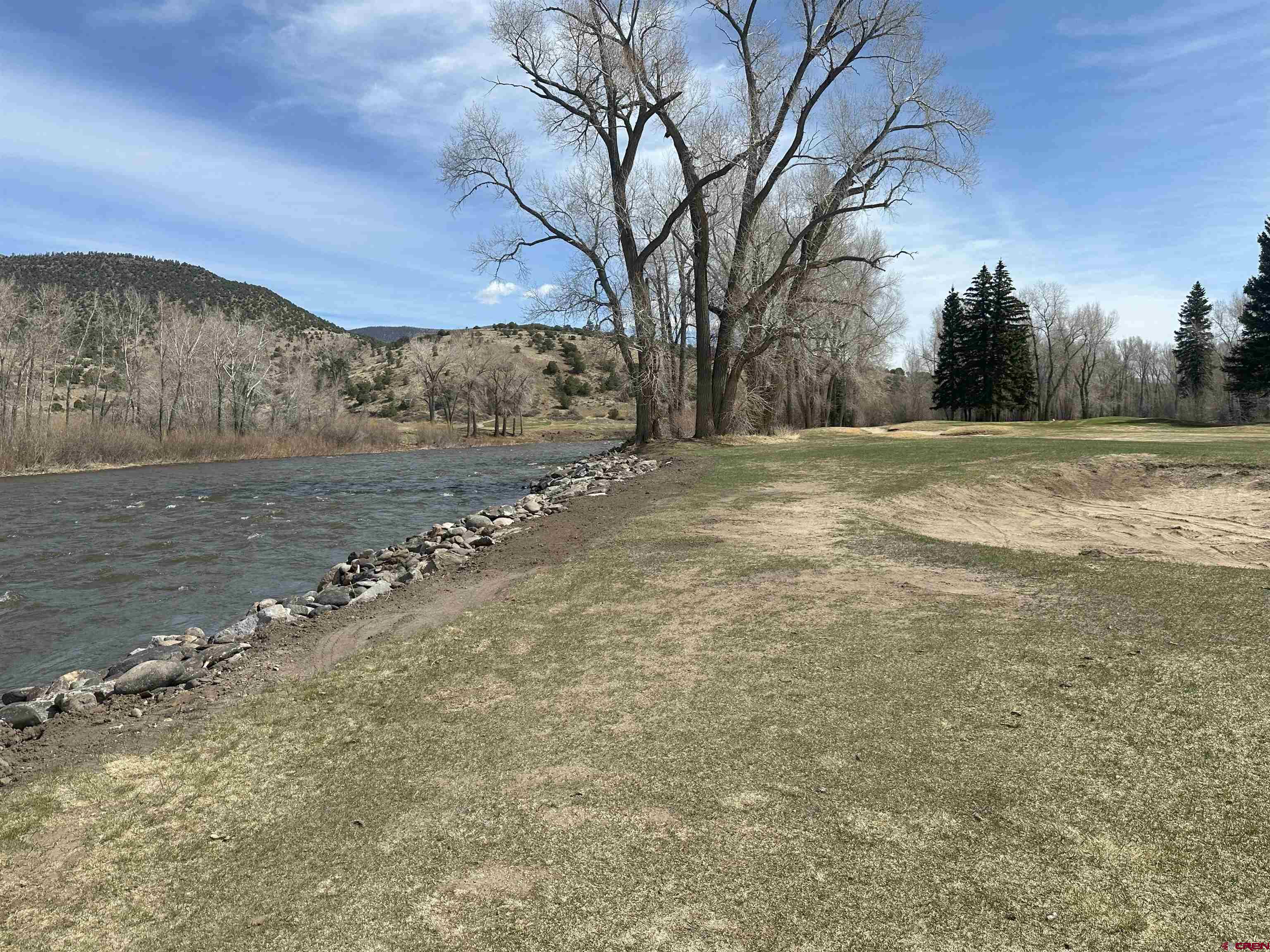 146 West Riverside Court South Fork, CO 81154 - Photo 11 of 12 a view of a yard with an empty space and mountain view