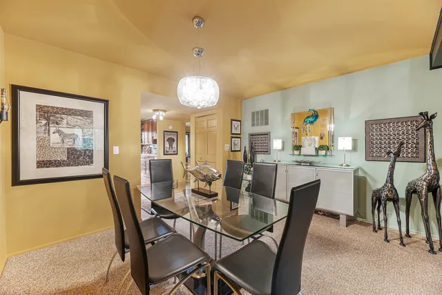a view of a dining room with furniture