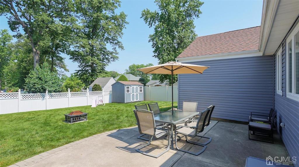 174 South Hill Road Colonia, NJ 07067 - Photo 25 of 31 a view of backyard with seating space and wooden fence