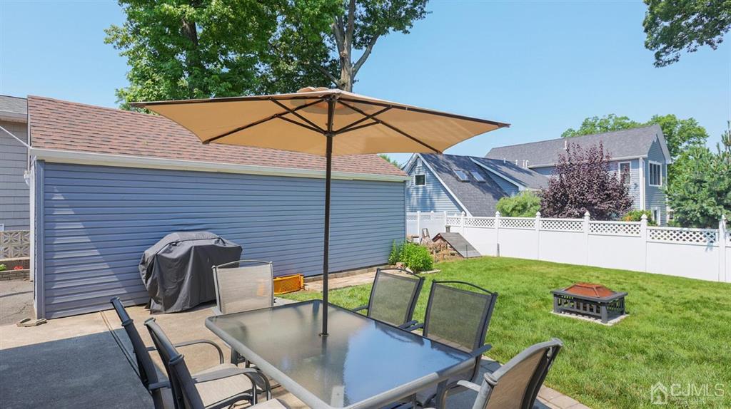 174 South Hill Road Colonia, NJ 07067 - Photo 26 of 31 a backyard of a house with seating space