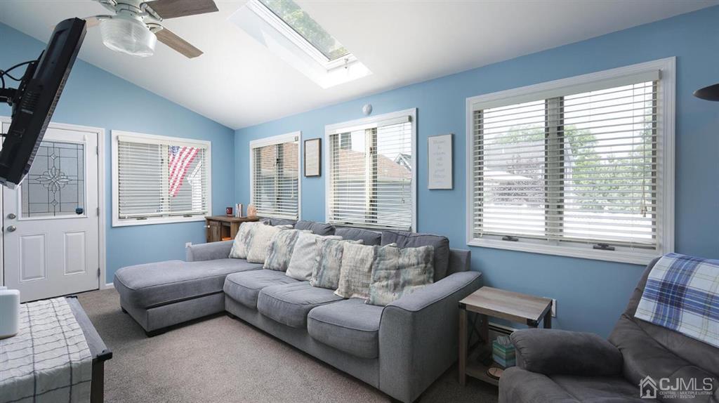 174 South Hill Road Colonia, NJ 07067 - Photo 4 of 31 a living room with furniture and a large window