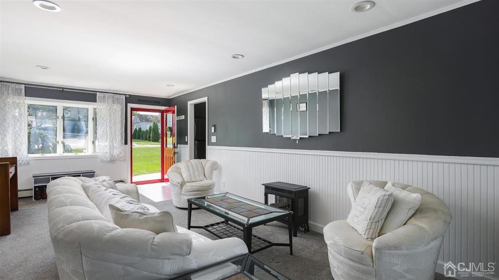 174 South Hill Road Colonia, NJ 07067 - Photo 5 of 31 a living room with furniture and a large window