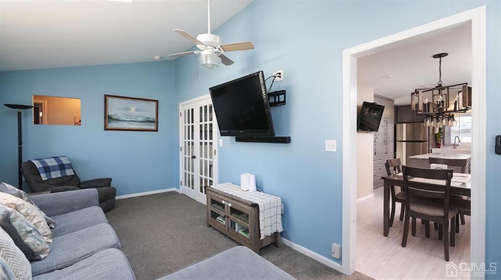 174 South Hill Road Colonia, NJ 07067 - Photo 9 of 31 a living room with furniture and a flat screen tv