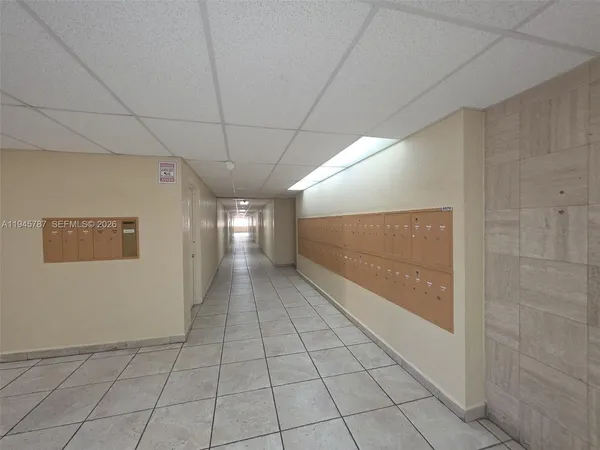 a view of hallway with a window