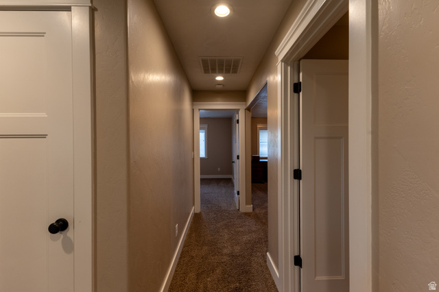 3565 West 1350th Street North Vernal, UT 84078 - Photo 26 of 54 Hallway with neutral tone walls and recessed lighting