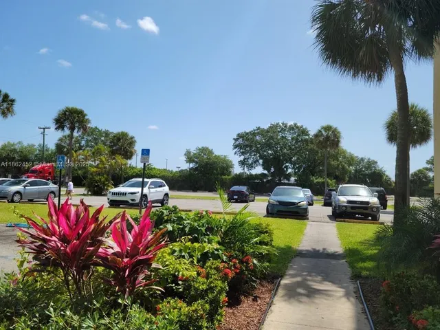 a view of building with yard