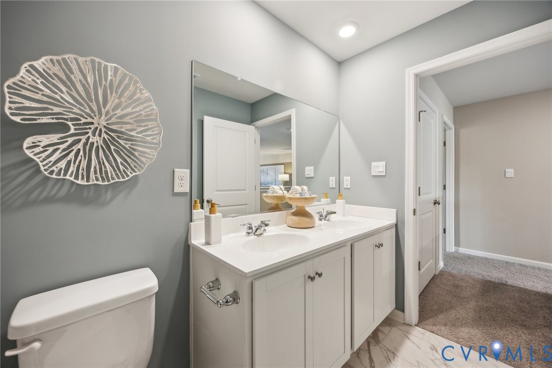 55 Liberty Lane Keswick, VA 22947 - Photo 13 of 34 a bathroom with a toilet a sink a mirror and a shower