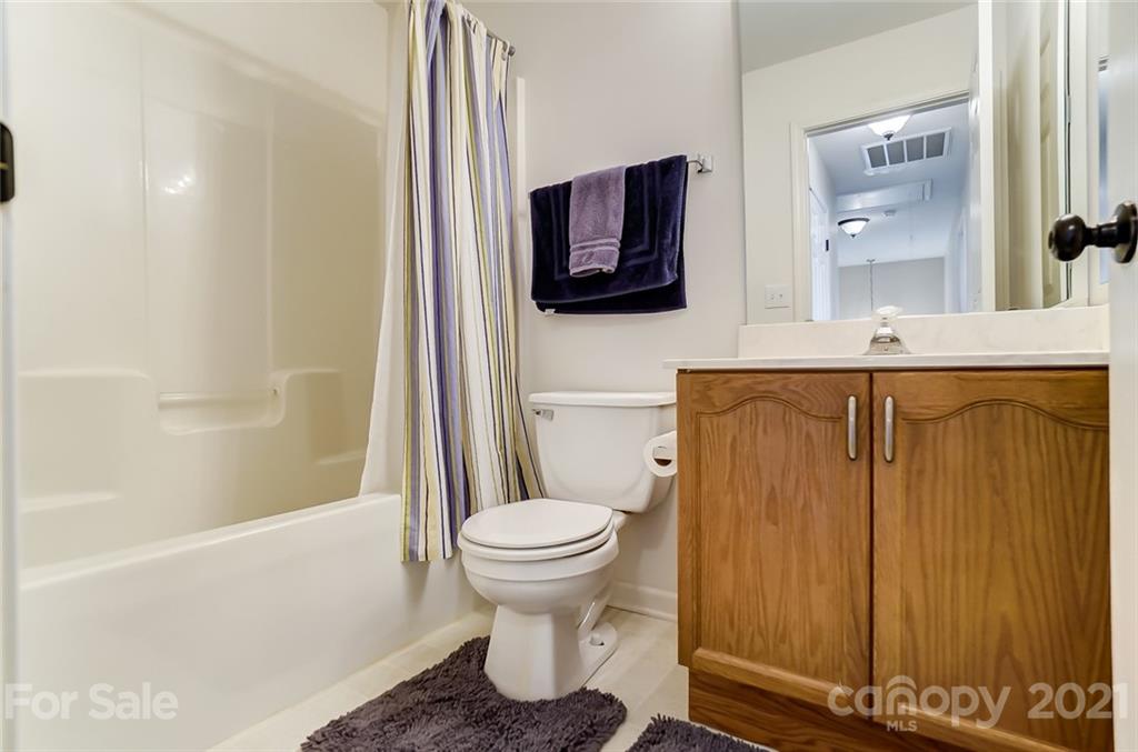 632 Eaton Court Fort Mill, SC 29708 - Photo 22 of 31 a bathroom with a toilet sink and mirror