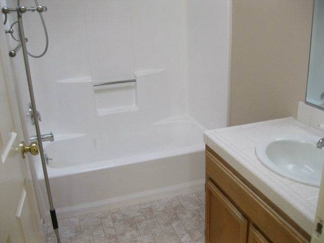 7246 Lotus Way Aptos, CA 95003 - Photo 12 of 17 a bathroom with a sink and a vanity