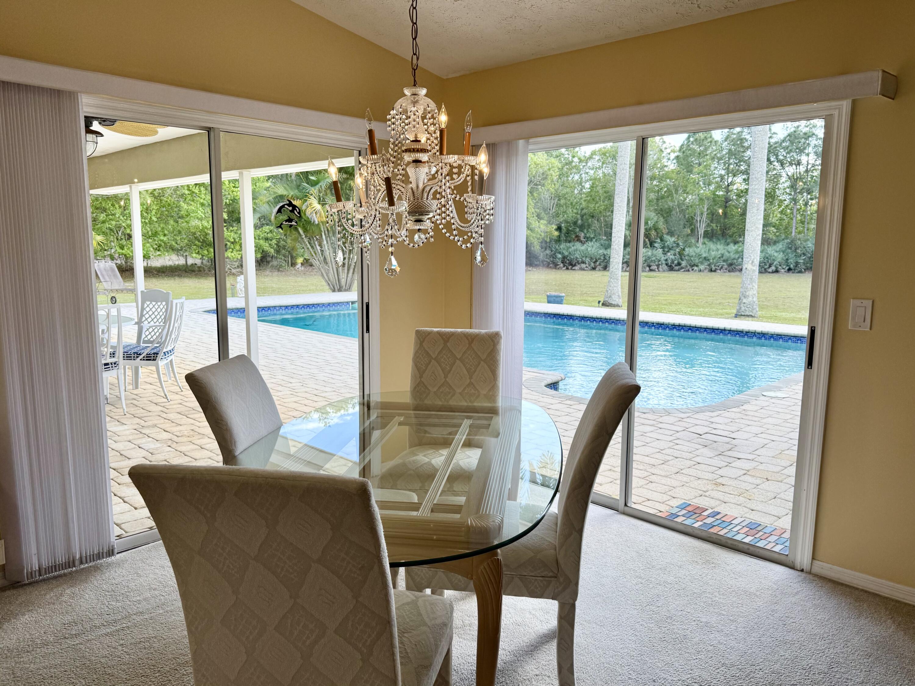 2884 Southeast Ranch Acres Circle Jupiter, FL 33478 - Photo 19 of 93 kitchen/dining