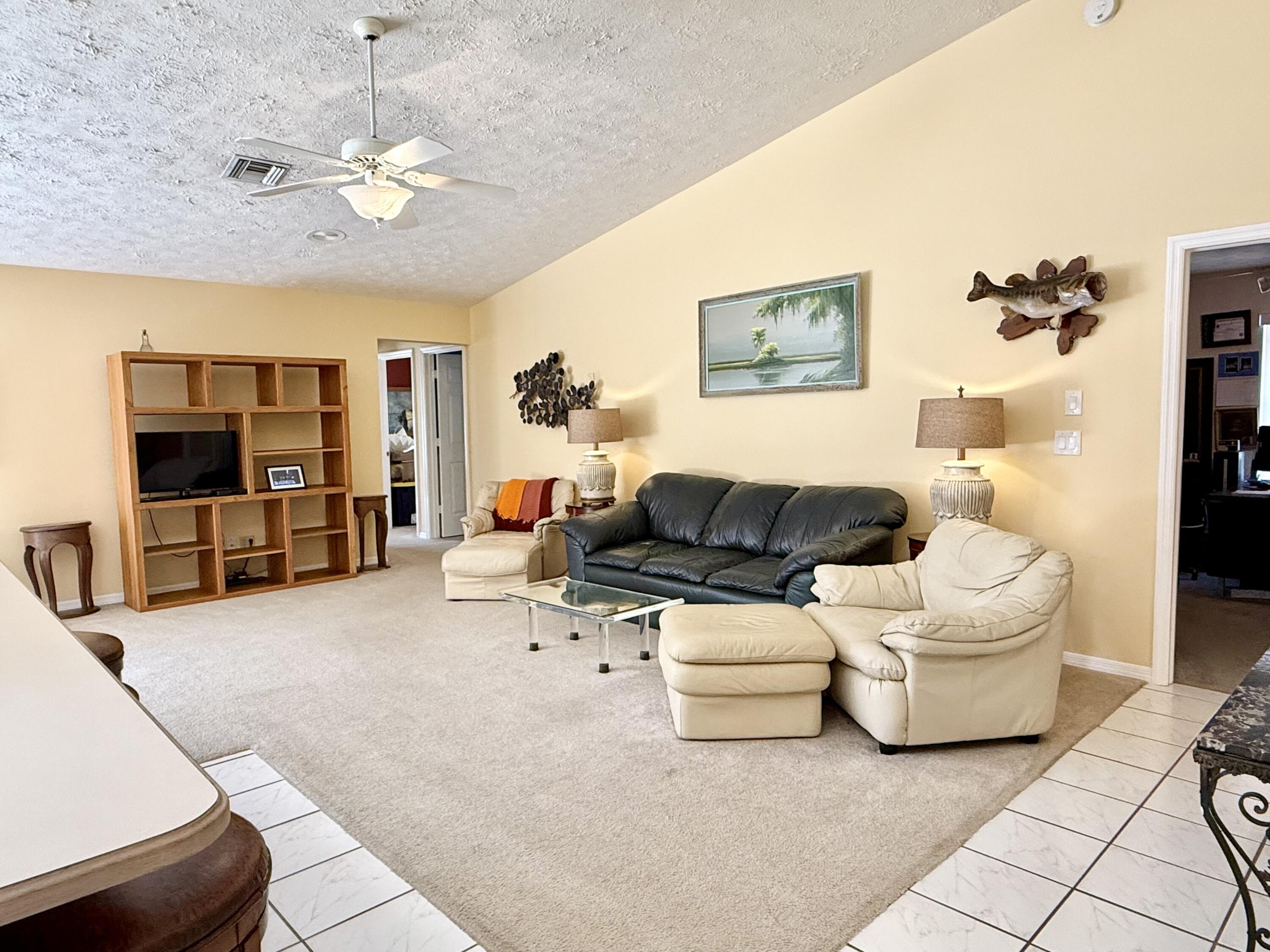 2884 Southeast Ranch Acres Circle Jupiter, FL 33478 - Photo 21 of 93 family room
