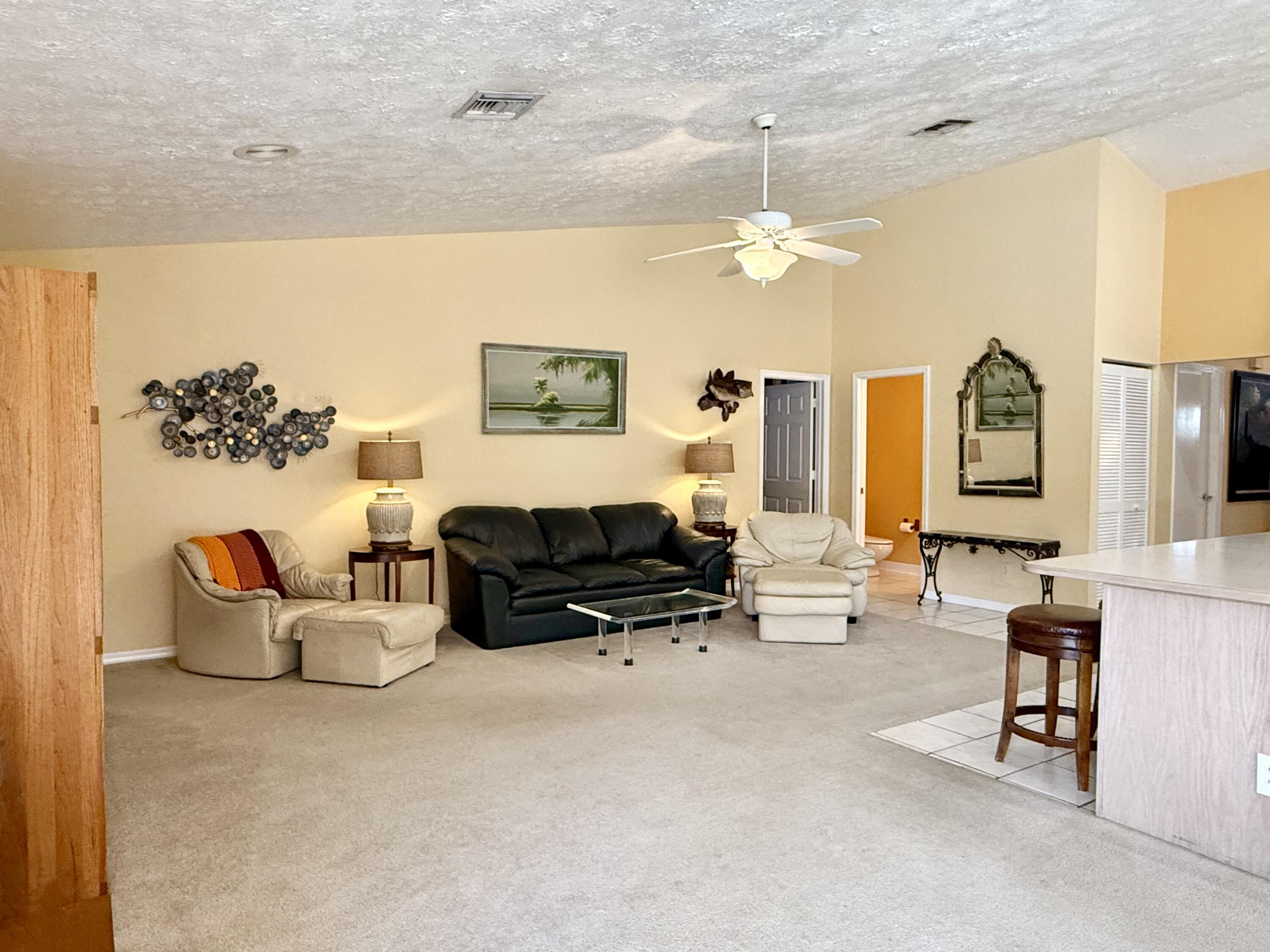 2884 Southeast Ranch Acres Circle Jupiter, FL 33478 - Photo 22 of 93 family room